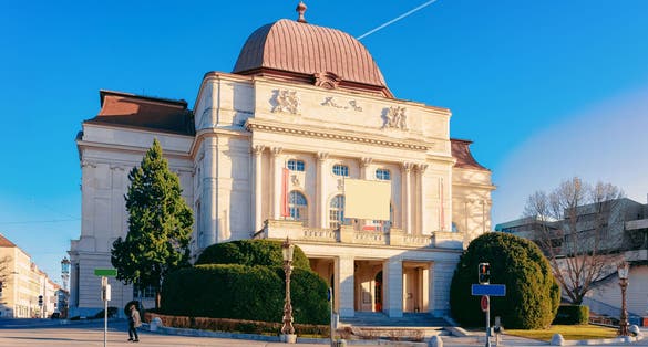 Photo of opera house building in street in Downtown and old city of Graz, Austria.