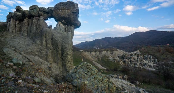 Photo of landscape with rock formation The Stone Dolls (Kameni kukli) of Kuklica near town of Kratovo, Republic of Macedonia.