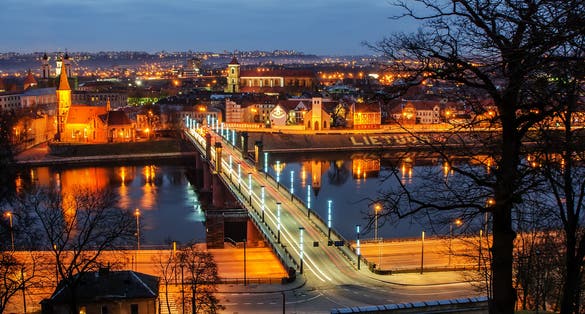 Kaunas, Lithuania: aerial view of Old Town in the beautiful sunset. Vytautas the Great Bridge.