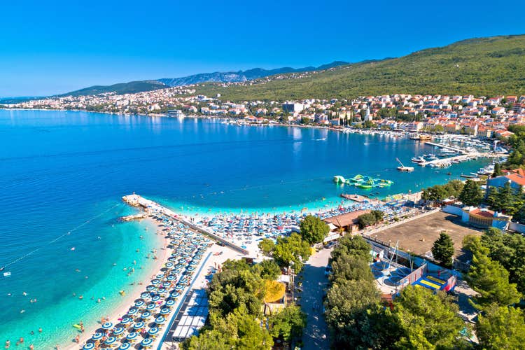 Tourist town of Selce and Poli Mora turquoise beach aerial view, Crikvenica riviera in Croatia
