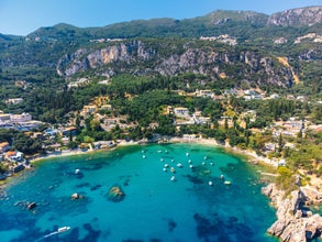 Photo of aerial view of Paleokastritsa with Spiros and Agia triada Beaches in Corfu Greece.