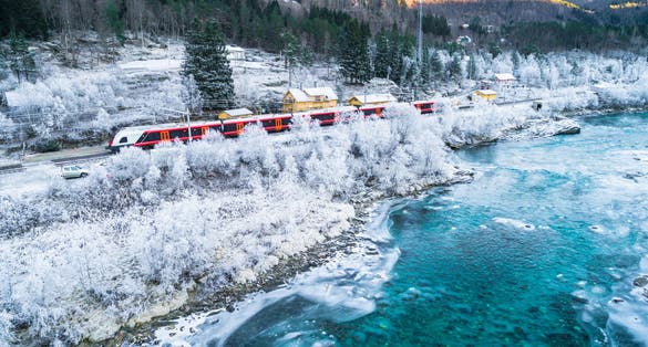 photo of train Oslo - Bergen in mountains. Hordaland, Norway.