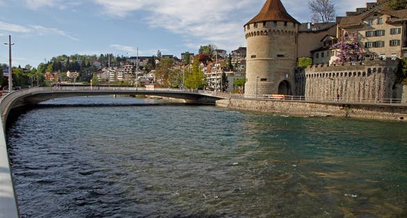 photo of morning view of Nölliturm one of the nine towers of the Musegg Wall in Lucerne, Switzerland.