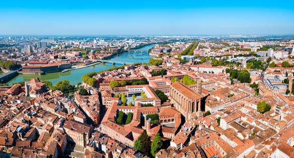 Photo of Toulouse and Garonne river aerial panoramic view, France.