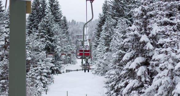 Photo of chairlift of Kranzberg in Mittenwald Germany in winter.