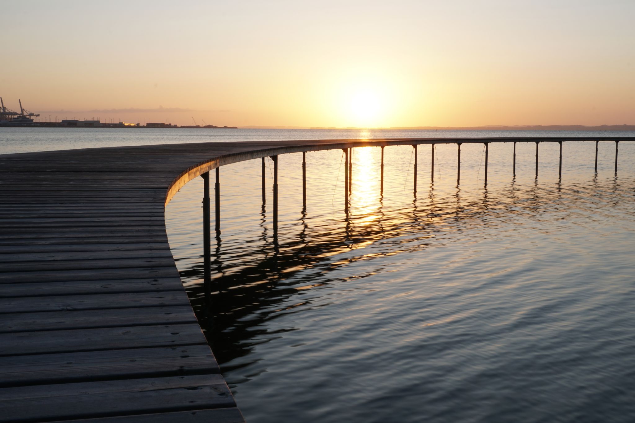 Photo of the Famous Infinite Bridge at sunset in Aarhus, Denmark.