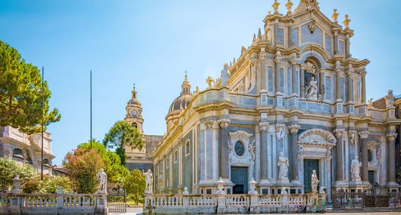 Photo of Piazza del Duomo with Cathedral of Santa Agatha in Catania, Sicily, Italy.