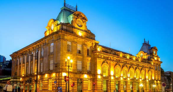 Photo of night view of sao bento station in porto, portugal.