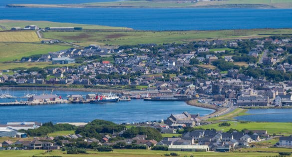photo of Panoramic view of Kirkwall, Mainland, Orkney from the top of Wideford Hill on a sunny day.