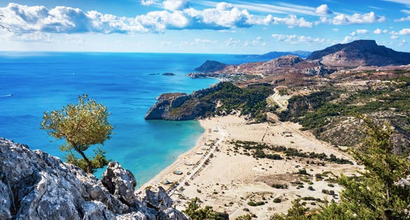 photo of view Tsambika beach with golden sand - view from Tsambika monastery (RHODES, GREECE).