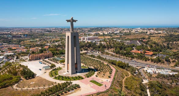 Photo of Catholic Statue with Jesus Christ in Almada near 25 de Abril bridge.