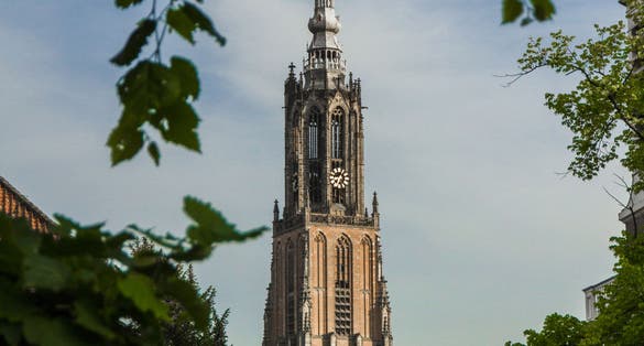 photo of medieval church tower Onze Lieve Vrouwetoren in Amersfoort, Netherlands.