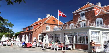 Scenic summer view of Nyhavn pier with color buildings, ships, yachts and other boats in the Old Town of Copenhagen, Denmark