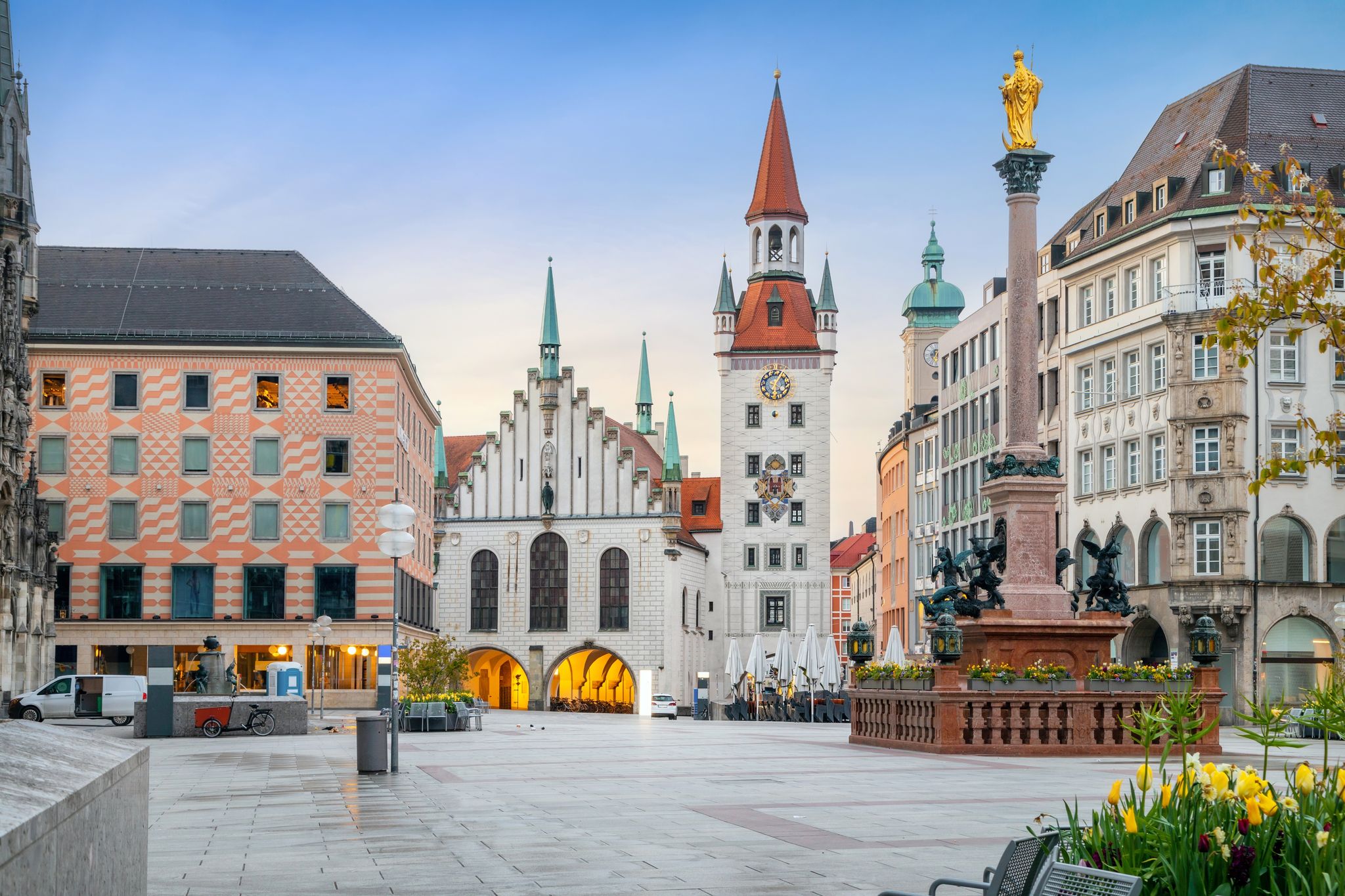 photo of view of Munich, Germany - View of Marienplatz square and building of historic Town Hall (Altes Rathaus)