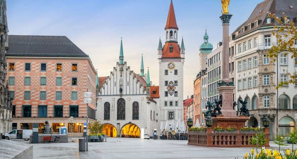 photo of view of Munich, Germany - View of Marienplatz square and building of historic Town Hall (Altes Rathaus)