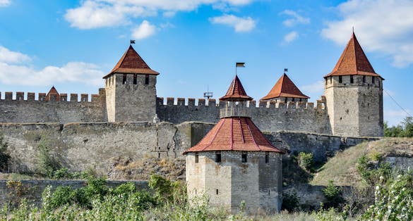 Photo of the view to towers of Bendery fortress from bank of Dniester river. Moldova. The fortress was built during the Ottoman times.