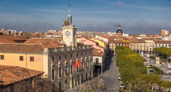 Photo of part of Cervantes Square, in the historic center of Alcalá de Henares, with the town hall in the foreground, Spain.