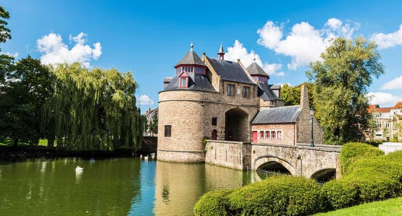 Ezelpoort (Donkey's gate), fortified gate on the river, in the medieval city of Bruges, Belgium