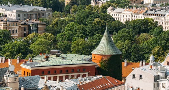 photo of aerial view of Riga, Latvia. Riga cityscape in sunny summer day. Famous landmark - Powder tower now part of latvian war museum.