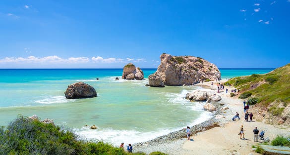 Photo of the famous beautiful beach of Aphrodite's rock or Venus rock, Petra tou Romiou, Cyprus.