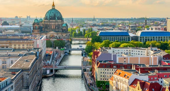 photo of view of Berlin Cathedral (Berliner Dom) on Museum island and Spree river at sunset, Germany