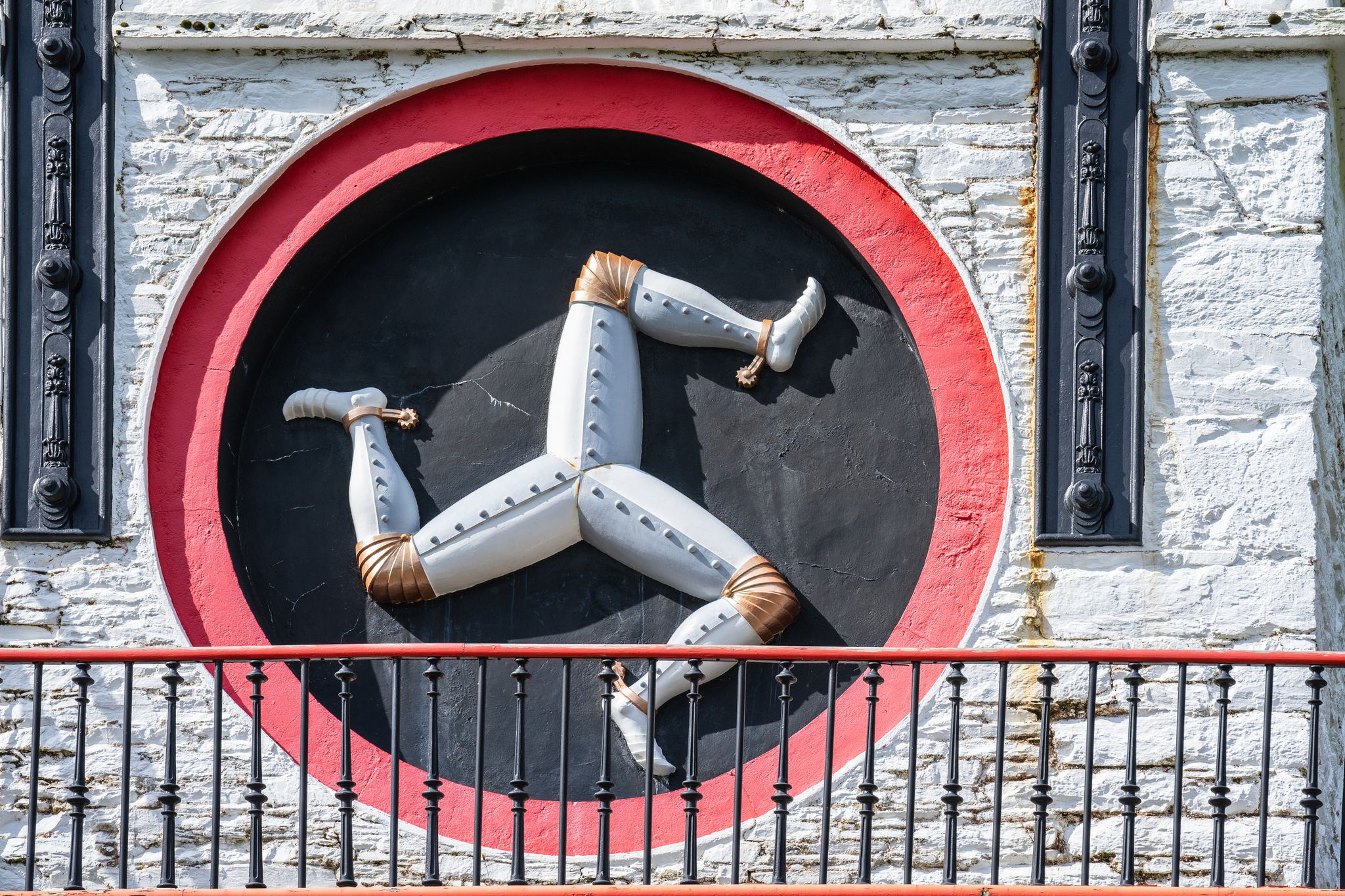 The Laxey Wheel also known as Lady Isabella is built into the hillside above the village of Laxey in the Isle of Man.