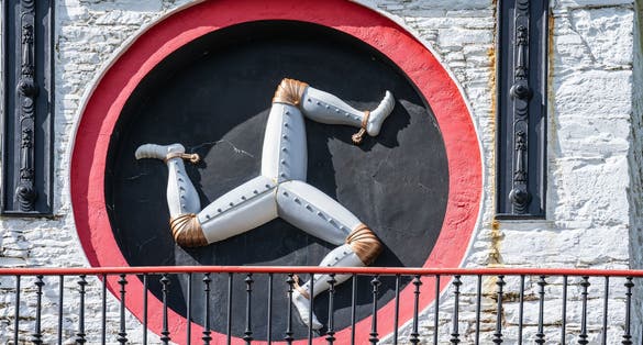 The Laxey Wheel also known as Lady Isabella is built into the hillside above the village of Laxey in the Isle of Man.