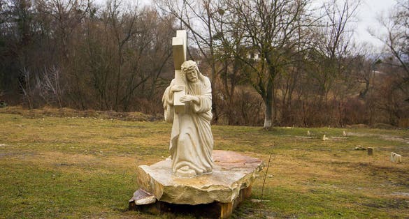 Photo of Sculpture of Jesus Christ carrying the cross in the monastery Condrita ,Moldova.