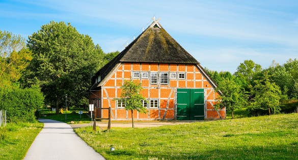 Old farm barn in the city of Wismar. Historic half-timbered house.