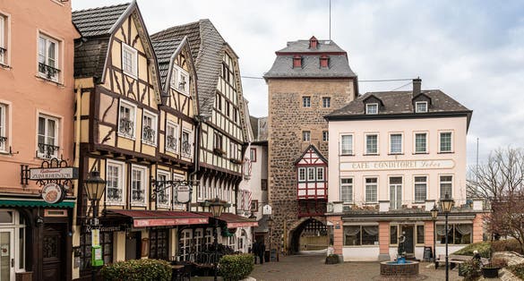 Photo of "Rheintor" (River Rhine Gate) with the former Customs House was the entrance gate to Linz and to "Schloßplatz" (Castle Square) with its half-timbered houses.