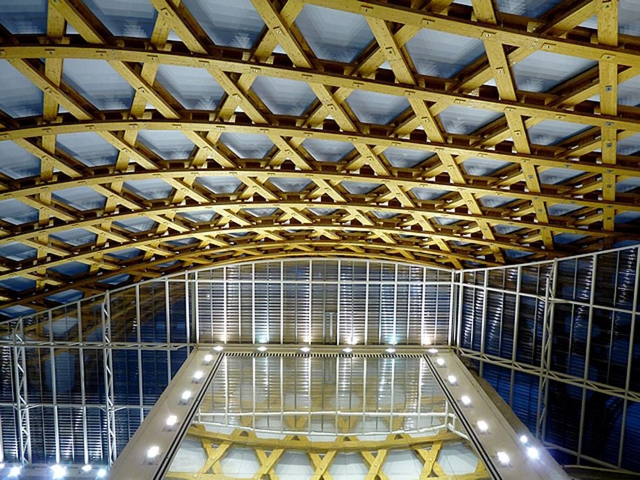 Interior view of the carpentry structure at night. 