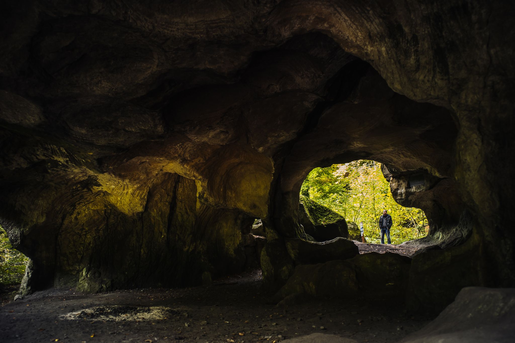  photo of hohllay cave in the forest of berdorf in Luxembourg