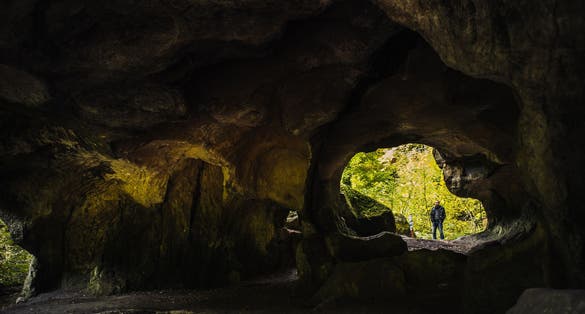  photo of hohllay cave in the forest of berdorf in Luxembourg