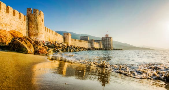 photo of a beautiful sunset on  Mamure Castle in Mersin, Turkey. 