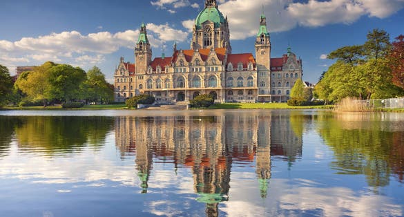 photo of view of City Hall of Hannover. Image of New City Hall of Hannover, Germany, during sunny spring day.