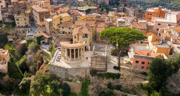 Aerial view of the temple of Sibyl in the park of Villa Gregoriana located in Tivoli, near Rome, Italy. It is an ancient Roman temple located on the acropolis of the city. It's of the Corinthian order