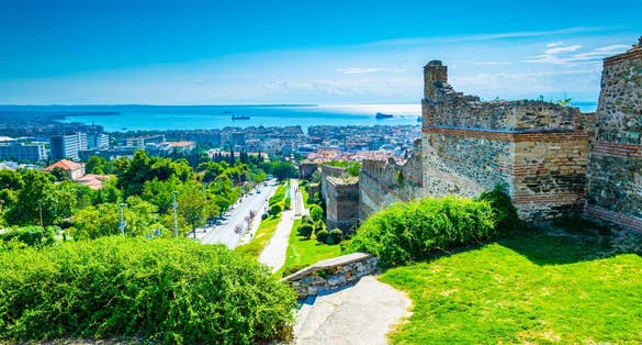 Photo of aerial view of Thessaloniki alongisde an old fortification, Greece.