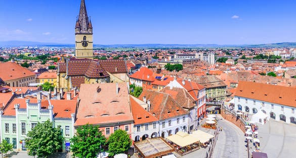 Sibiu, Romania, Lutheran cathedral tower and Small Square (Piata Mica).