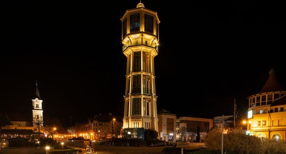 photo of view of the water tower of Siófok city at night, Siófok, Hungary.