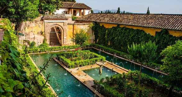 Photo of Generalife gardens with fountains in Alhambra,Granada,Spain.