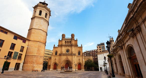 Photo of Wide angle shot of Fadri tower and Gothic Cathedral. Castellon de la Plana, Spain .