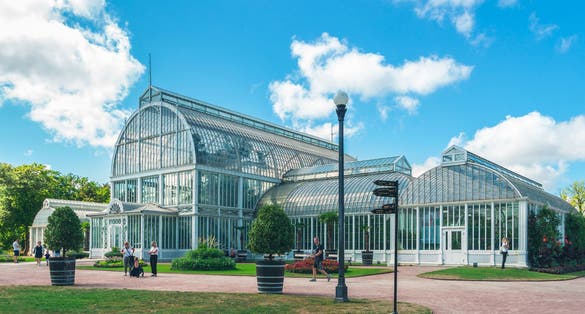 Photo of beautiful glass greenhouse in Gothenburg Botanical Garden, Sweden.