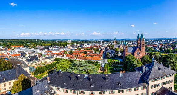 Photo of panoramic view of Bad Homburg twith Frankfurt at horizon and aerial of the castle .