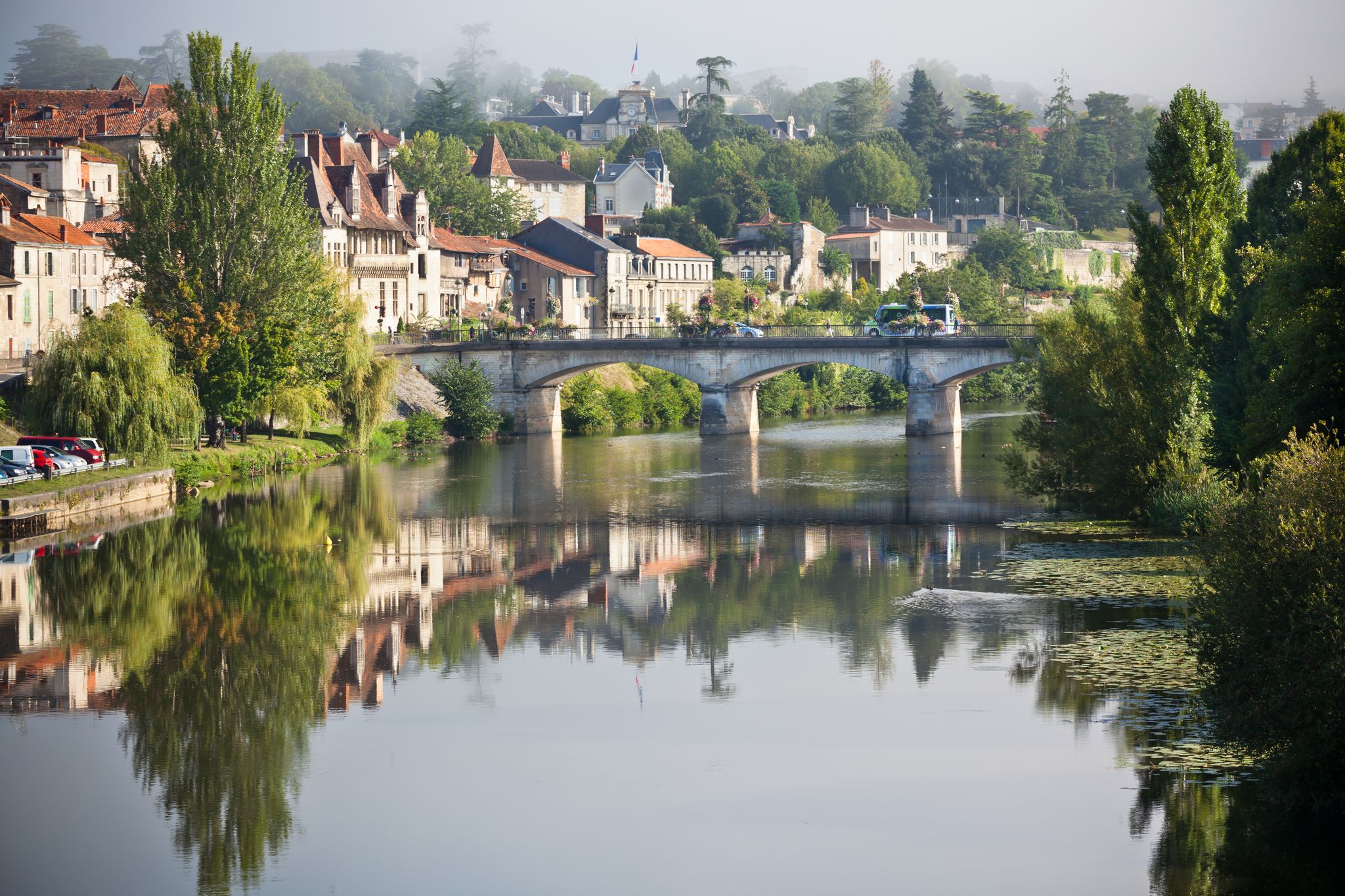Photo of Picturesque view of Perigord town in France. Landscape with the river Vezere.