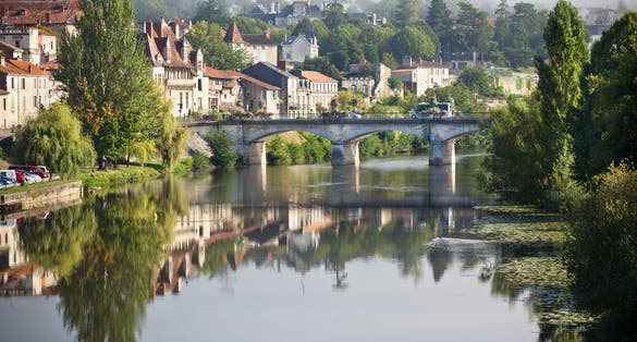Photo of Picturesque view of Perigord town in France. Landscape with the river Vezere.