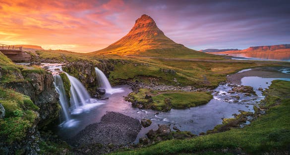 Kirkjufell Mountain on the Snaefellsnes Peninsula in Iceland at sunset.