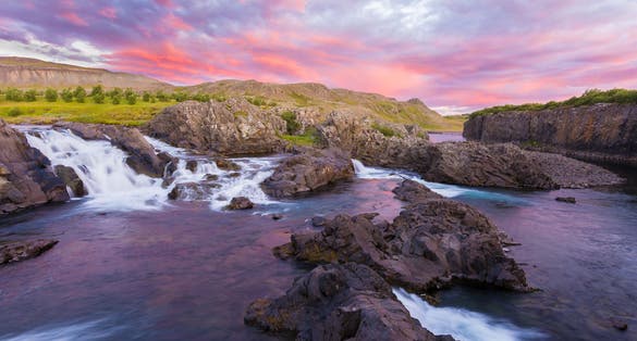 photo of Iceland Landscape Long exposure photography: Glanni waterfall at sunset, Iceland .