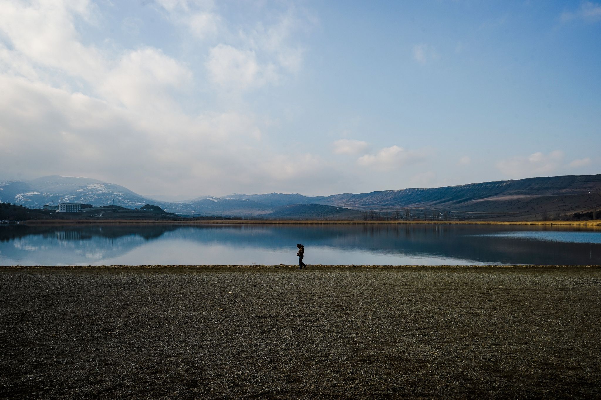 Fisherman on lake Lisi in Georgia