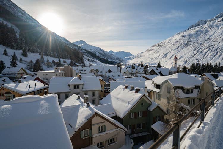 Photo of Winter sunset over Andermatt village.