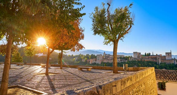 Photo of Alhambra sunrise in Granada from San Nicolas lookout in Spain at Albaicin.